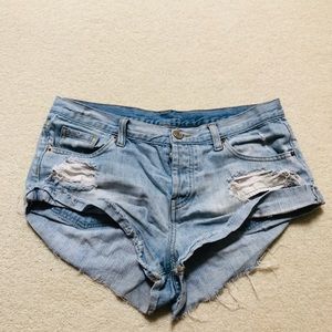 Distressed button up shorts